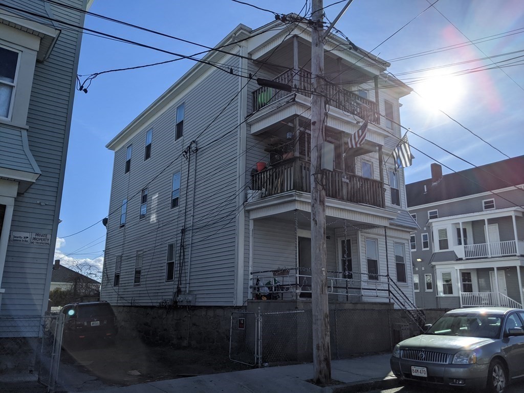 18 John Street Fall River, MA 02721 - Photo 3 of 10 a front view of a building with street