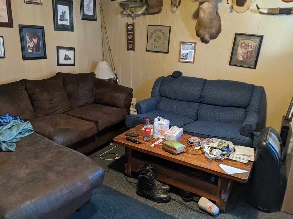 18 John Street Fall River, MA 02721 - Photo 6 of 10 a living room with furniture and a flat screen tv