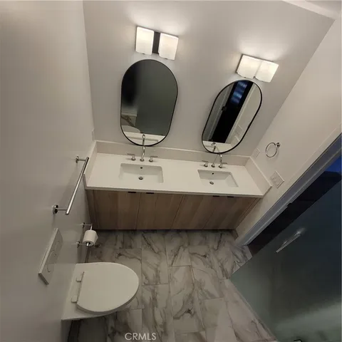 a bathroom with a bathtub and a sink