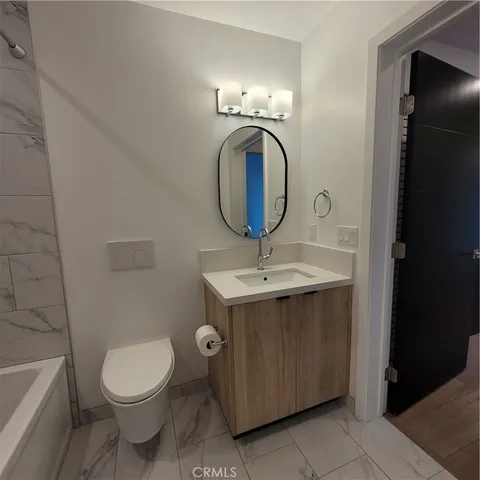 a view of a room that has a window