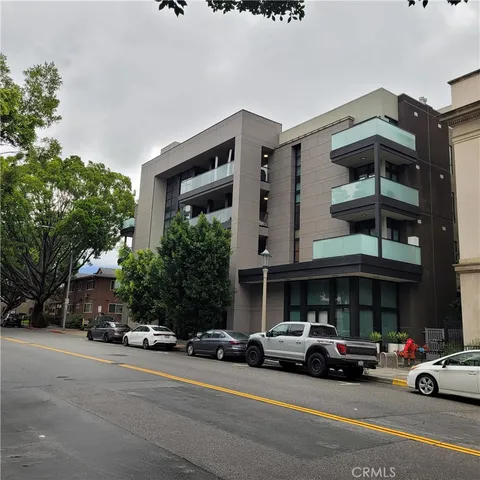 a car parked in front of a building