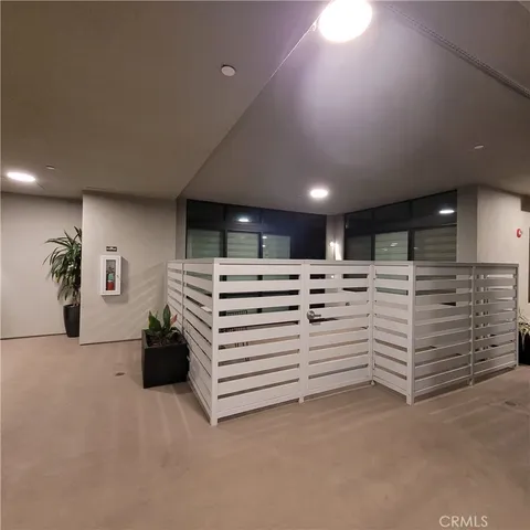 a bed room with bed and window