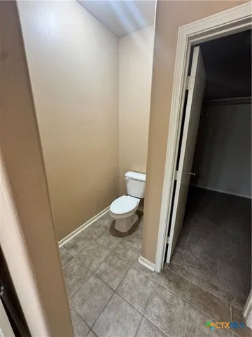 a bathroom with a toilet