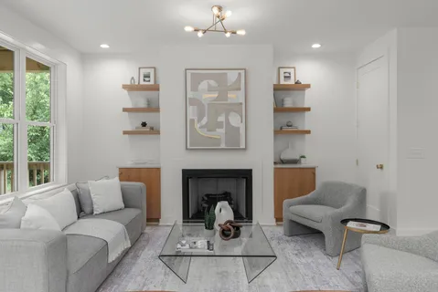 a spacious bedroom with a large bed and a window