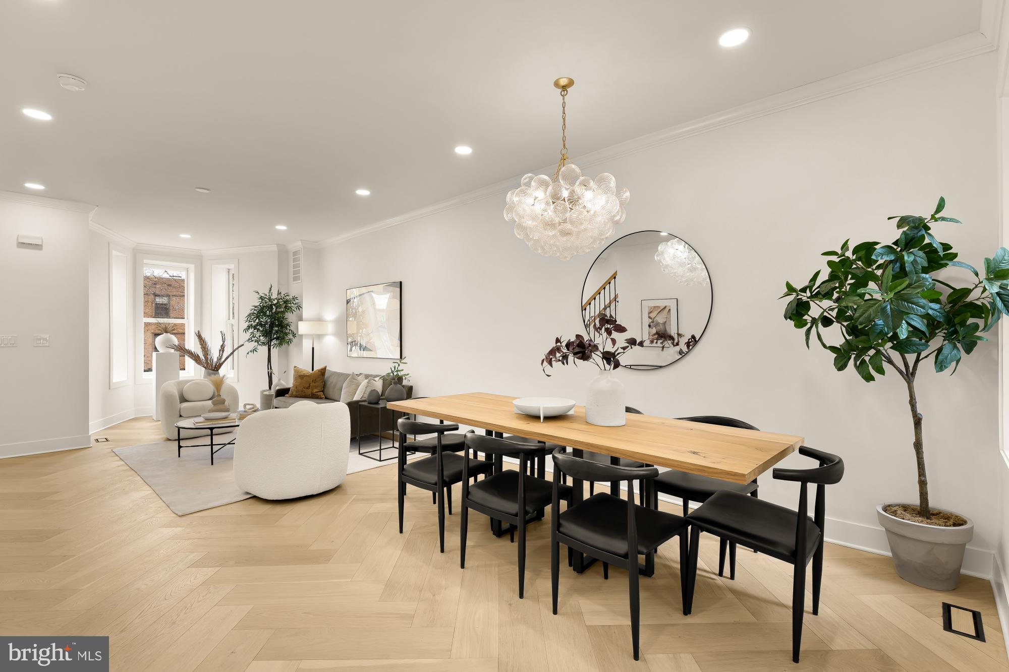 1932 11th Street Northwest Washington, DC 20001 - Photo 12 of 53 a view of a dining room with furniture and chandelier