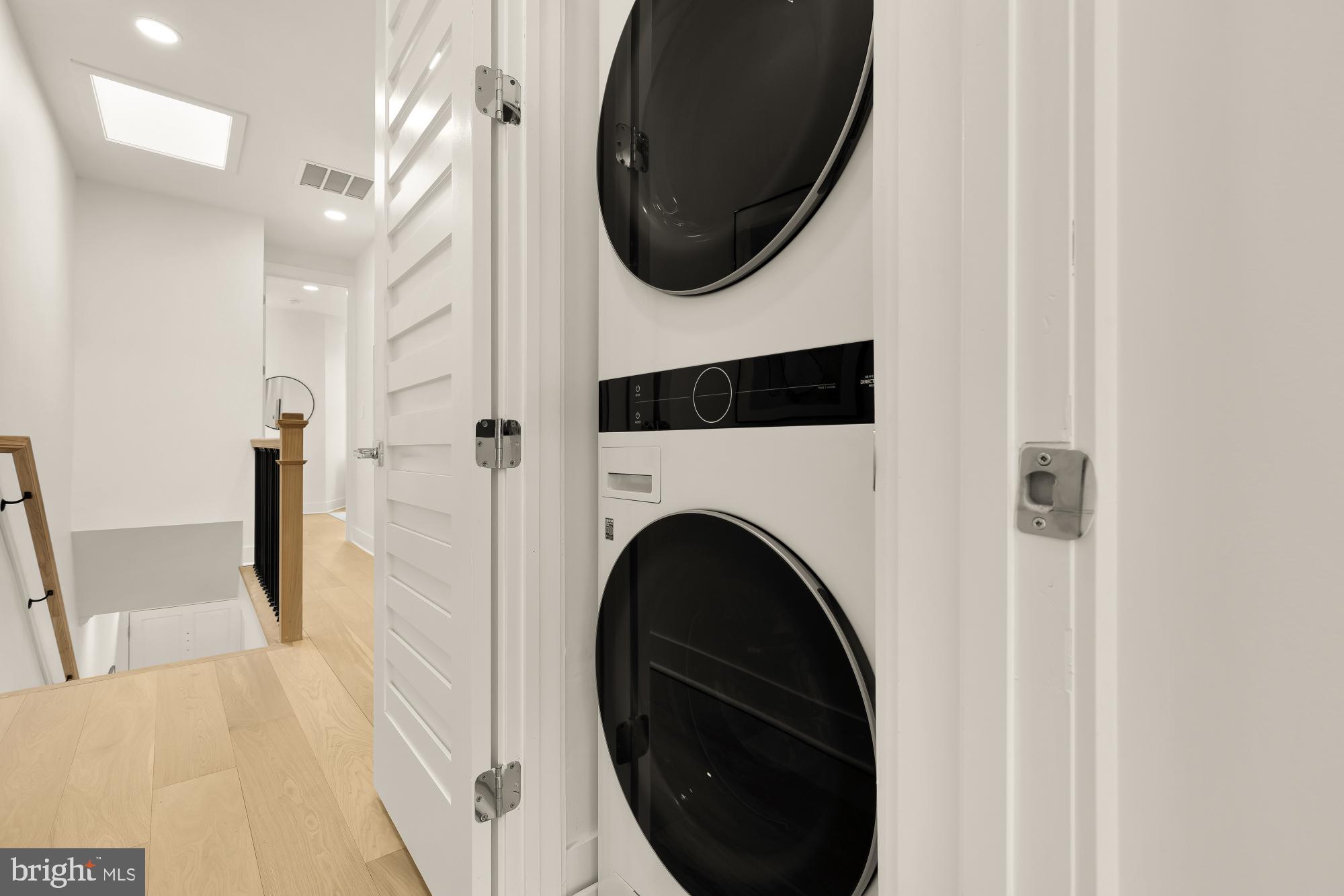 1932 11th Street Northwest Washington, DC 20001 - Photo 22 of 53 a view of a hallway with washer and dryer