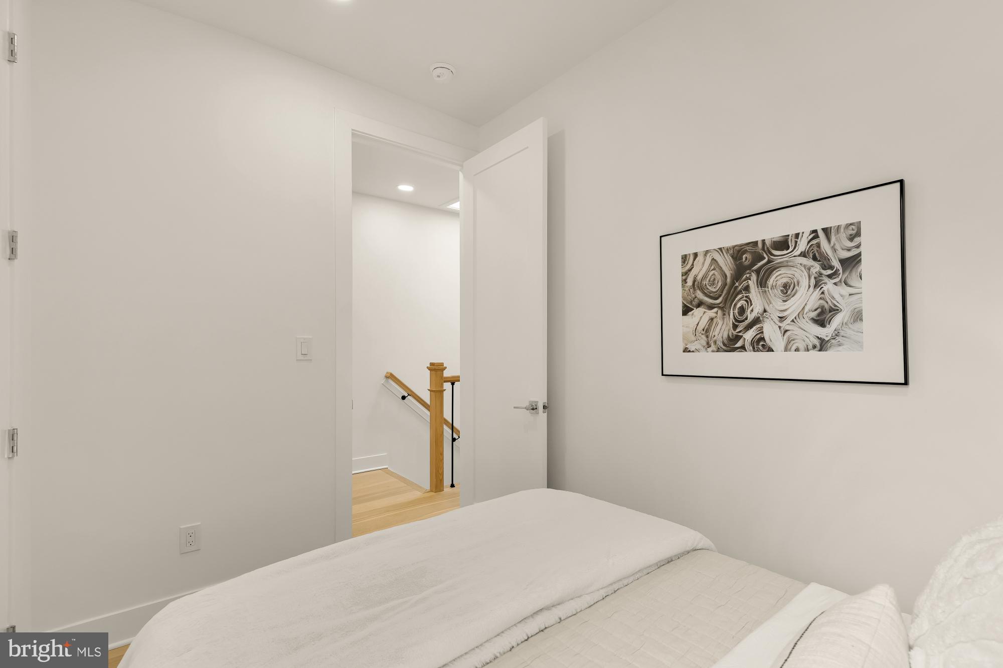 1932 11th Street Northwest Washington, DC 20001 - Photo 25 of 53 a bedroom with a bed and wall painting