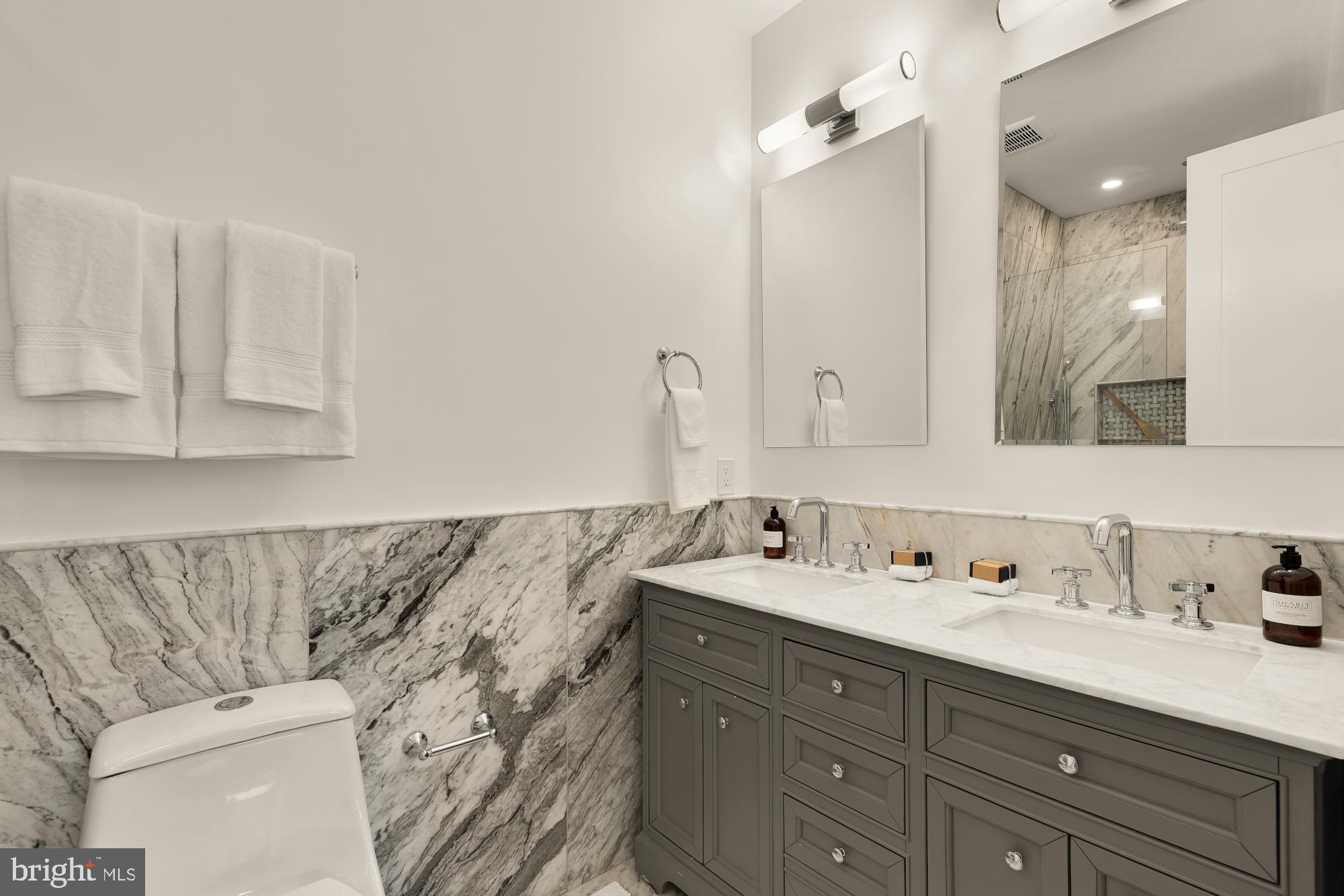 1932 11th Street Northwest Washington, DC 20001 - Photo 33 of 53 a bathroom with a sink and a mirror