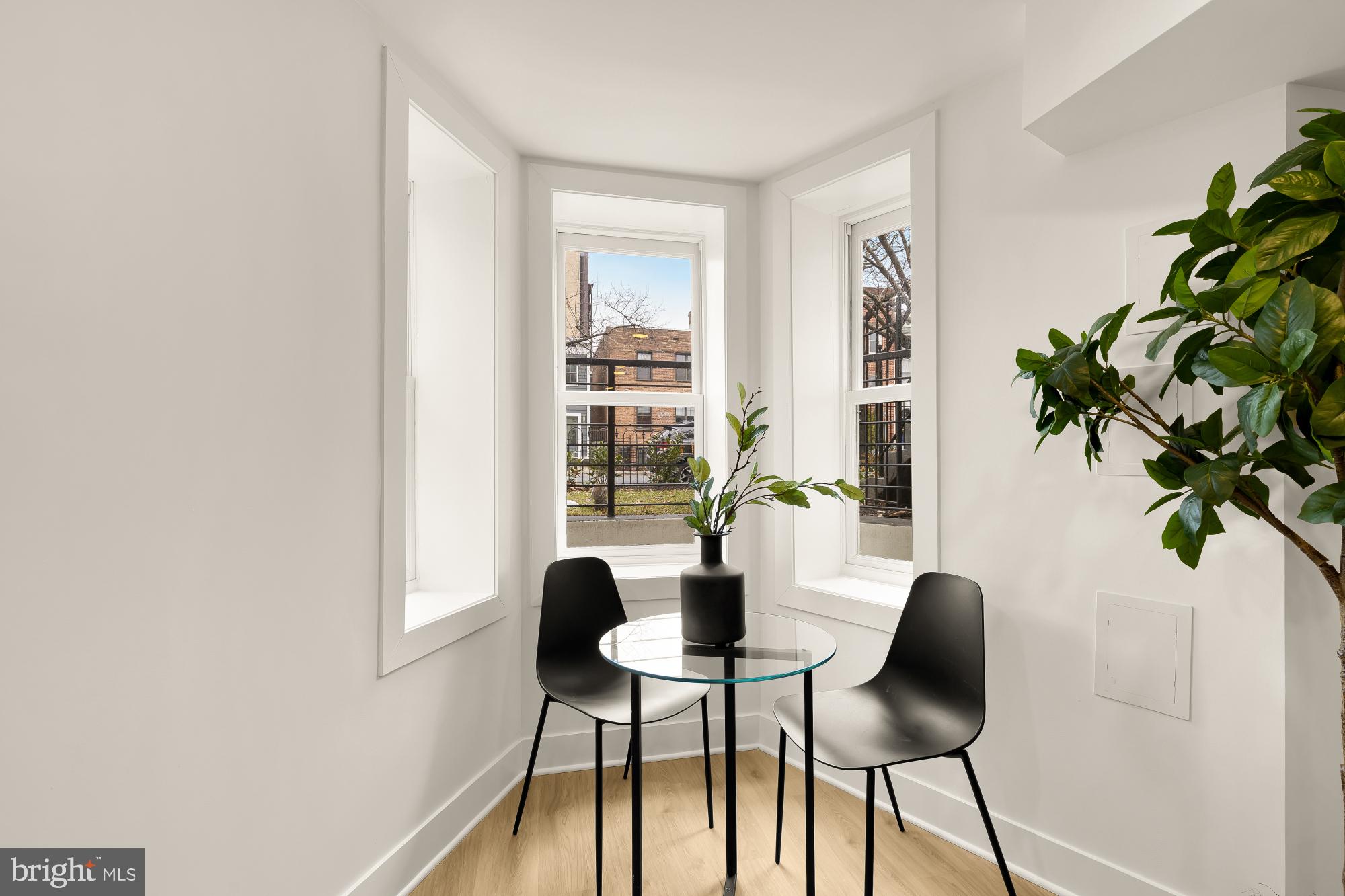 1932 11th Street Northwest Washington, DC 20001 - Photo 38 of 53 a dining room with furniture and window