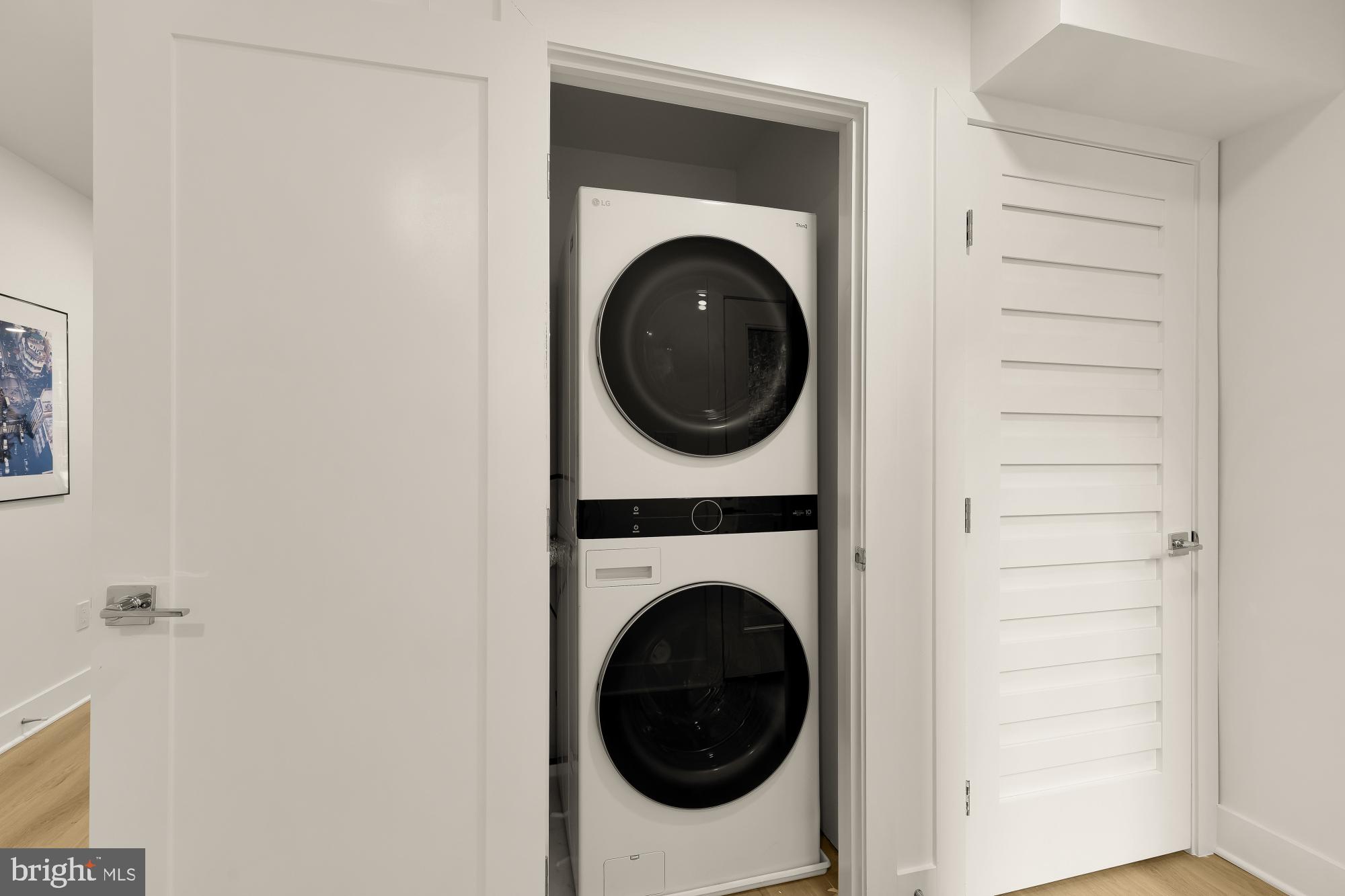 1932 11th Street Northwest Washington, DC 20001 - Photo 42 of 53 a utility room with dryer and washer
