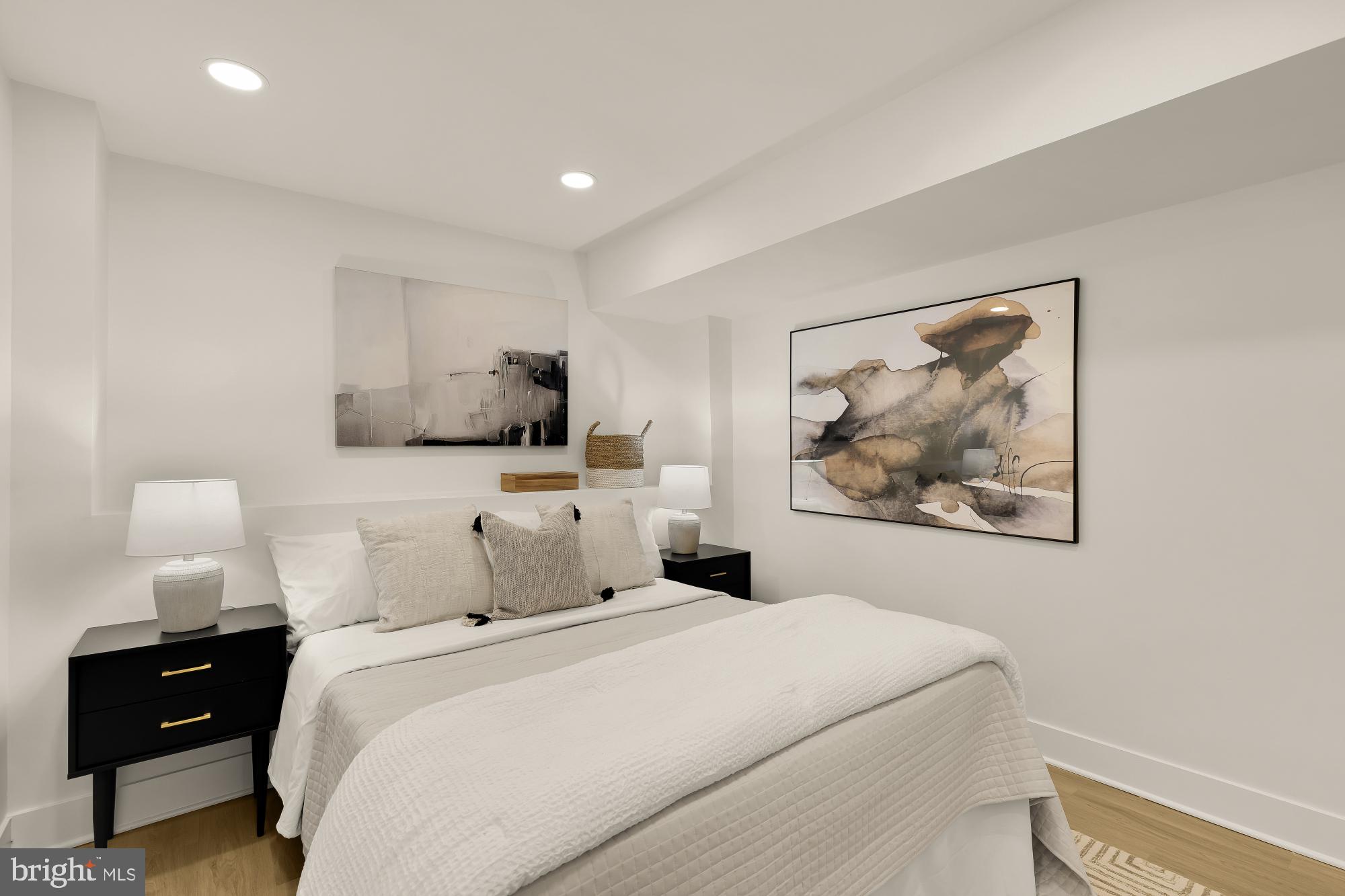 1932 11th Street Northwest Washington, DC 20001 - Photo 45 of 53 a bedroom with a bed and a night stand