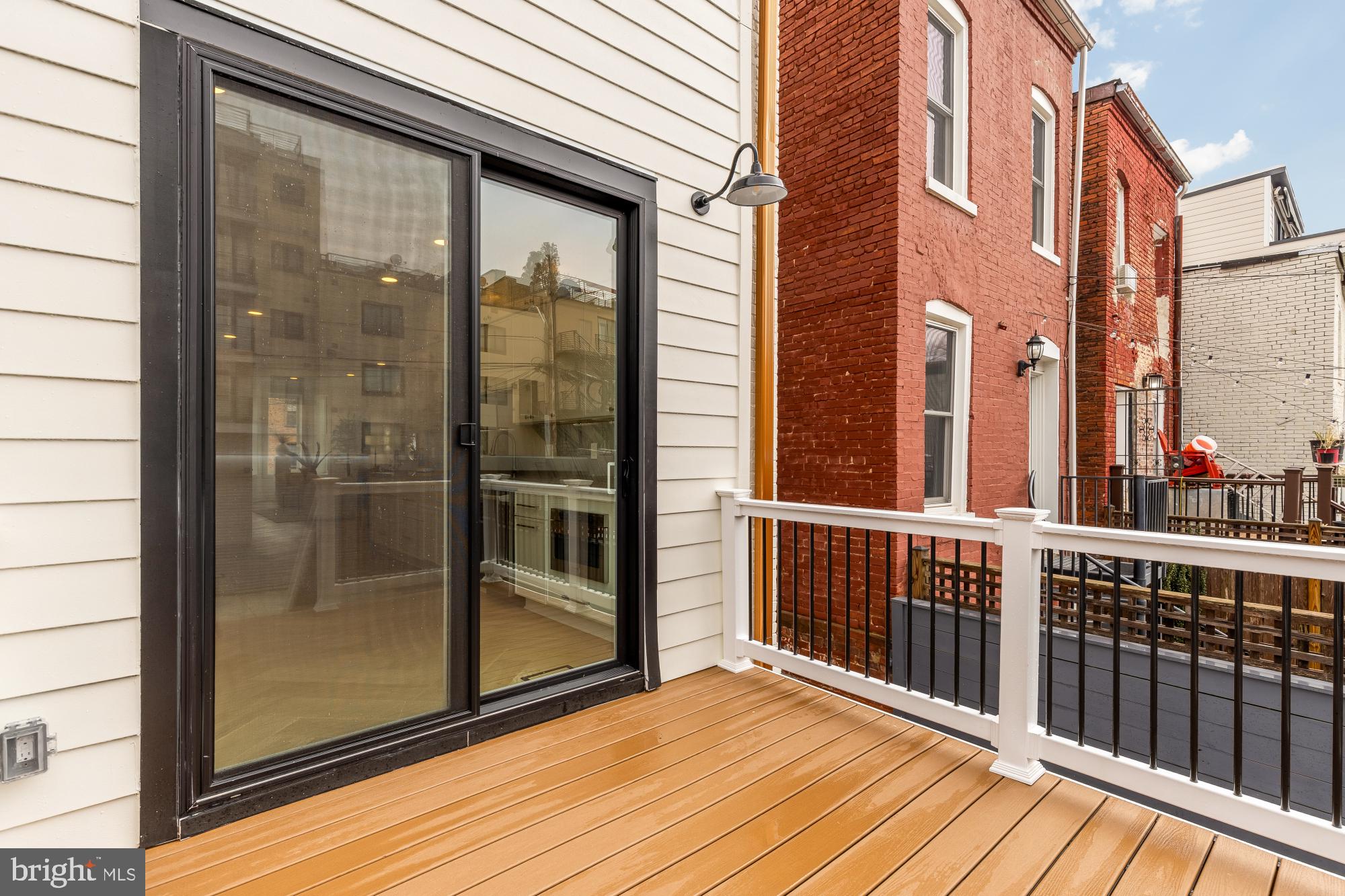 1932 11th Street Northwest Washington, DC 20001 - Photo 48 of 53 a view of a balcony with a floor to ceiling window