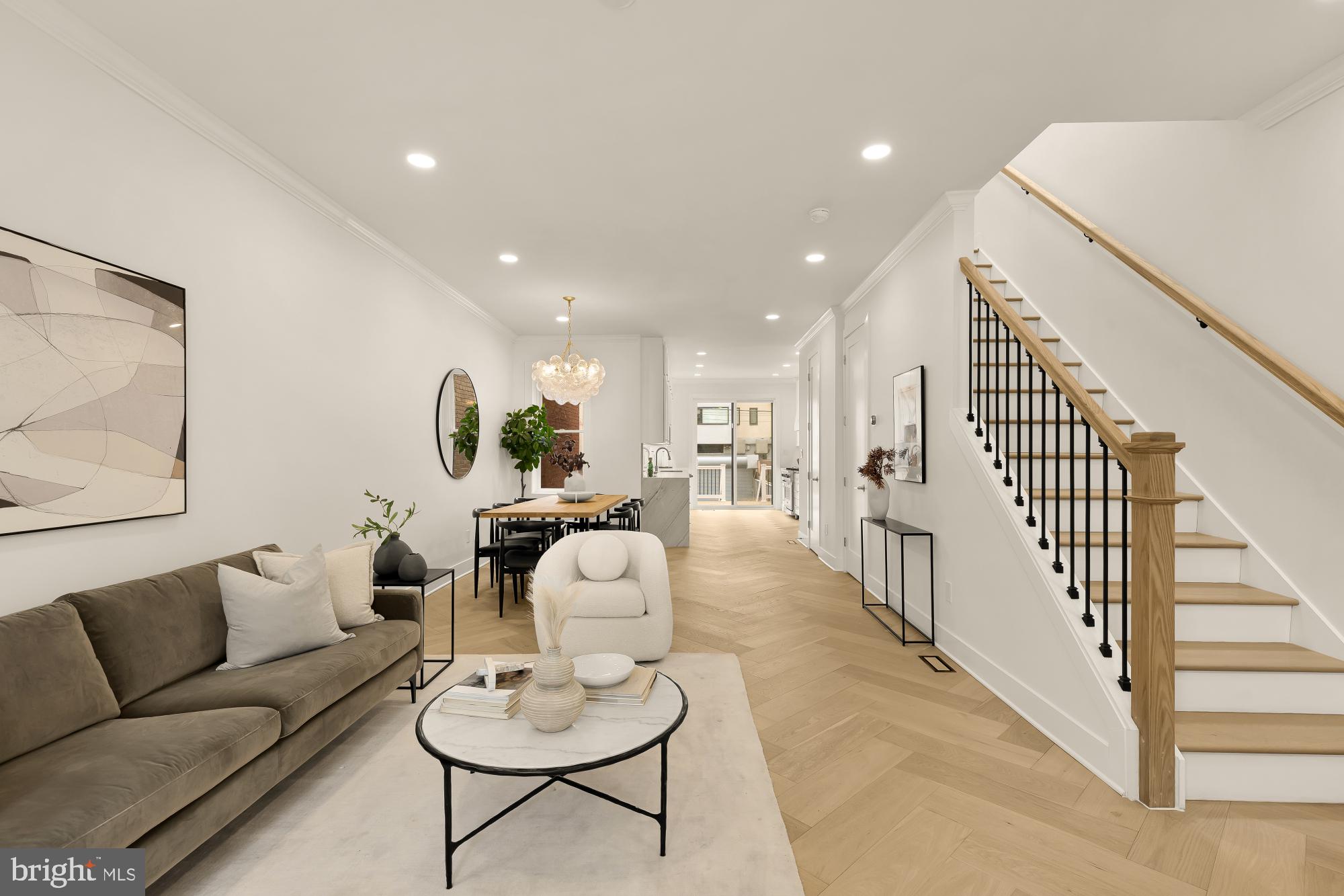 1932 11th Street Northwest Washington, DC 20001 - Photo 5 of 53 a living room with furniture kitchen view and a wooden floor