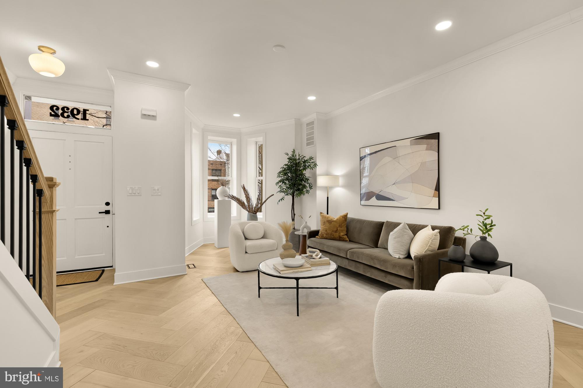 1932 11th Street Northwest Washington, DC 20001 - Photo 7 of 53 a living room with furniture and a large window