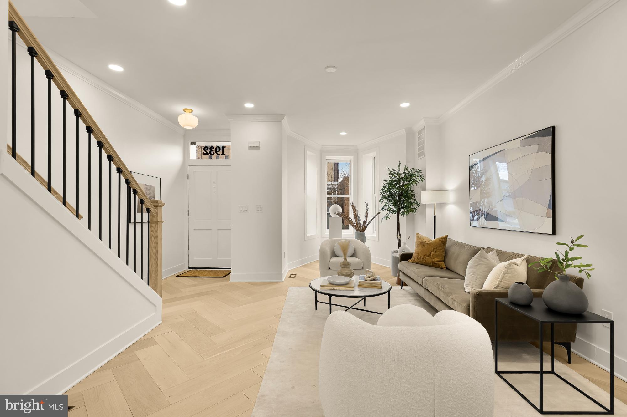 1932 11th Street Northwest Washington, DC 20001 - Photo 8 of 53 a living room with furniture and a large window