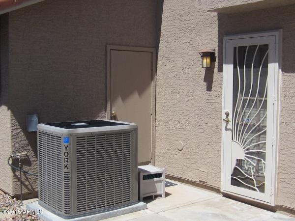 3318 East Desert Trumpet Road Phoenix, AZ 85044 - Photo 19 of 22 outside_entry_new_hvac_unit