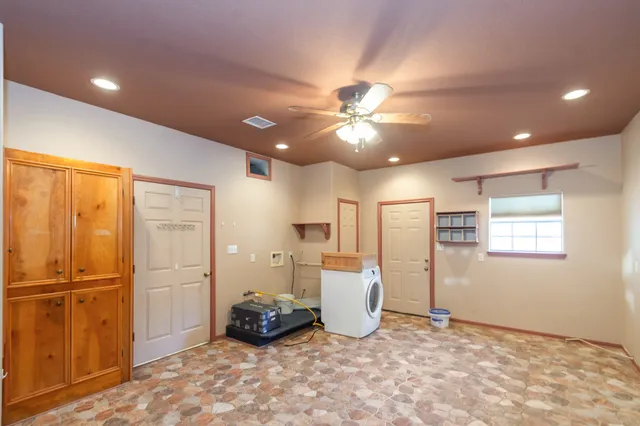 a view of a livingroom with furniture