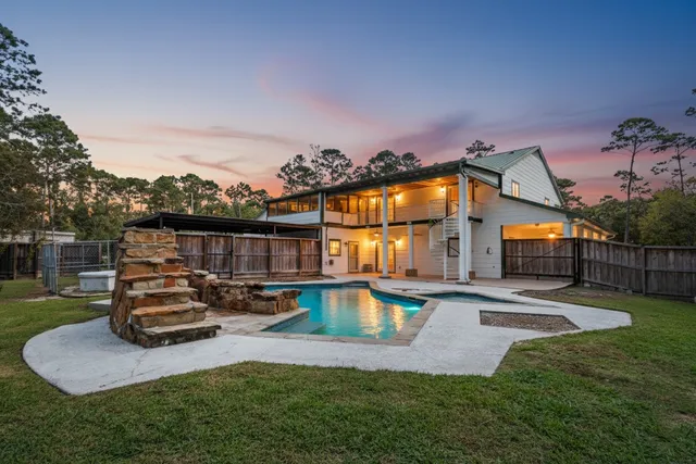 a house view with a sitting space and garden space