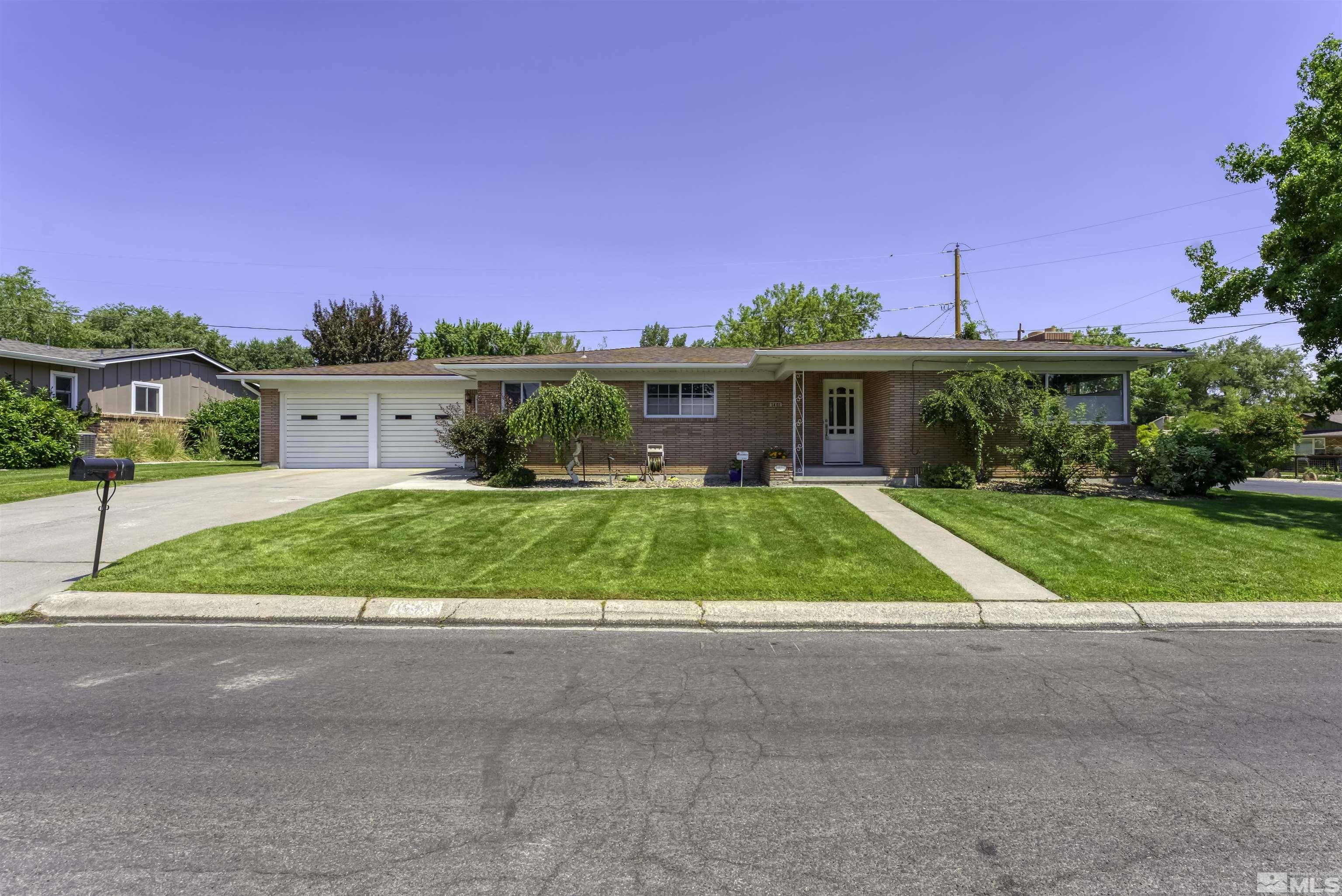 1401 Romero Way Reno, NV 89509 - Photo 1 of 28 a view of house next to a yard
