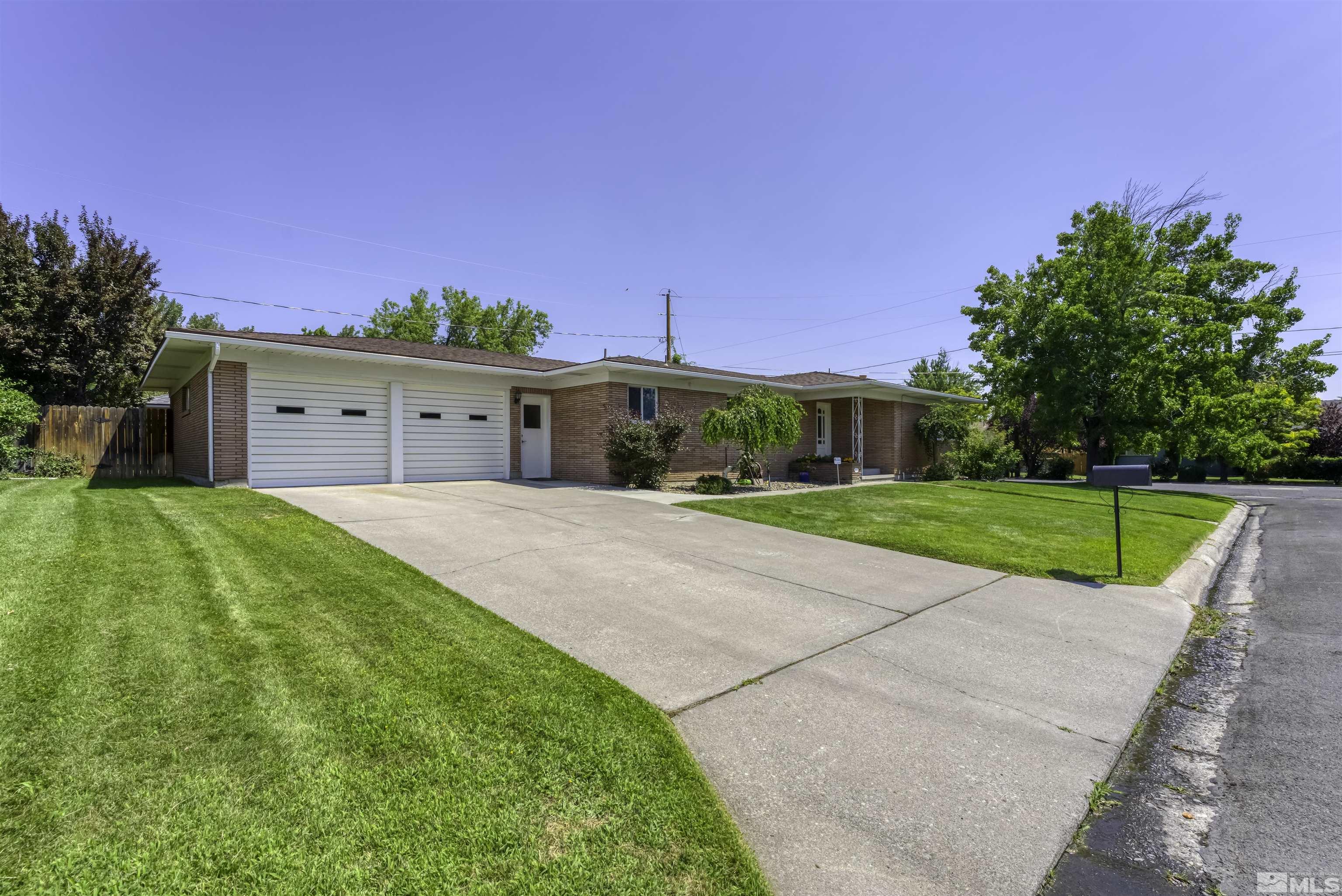 1401 Romero Way Reno, NV 89509 - Photo 2 of 28 a view of house with swimming pool and yard