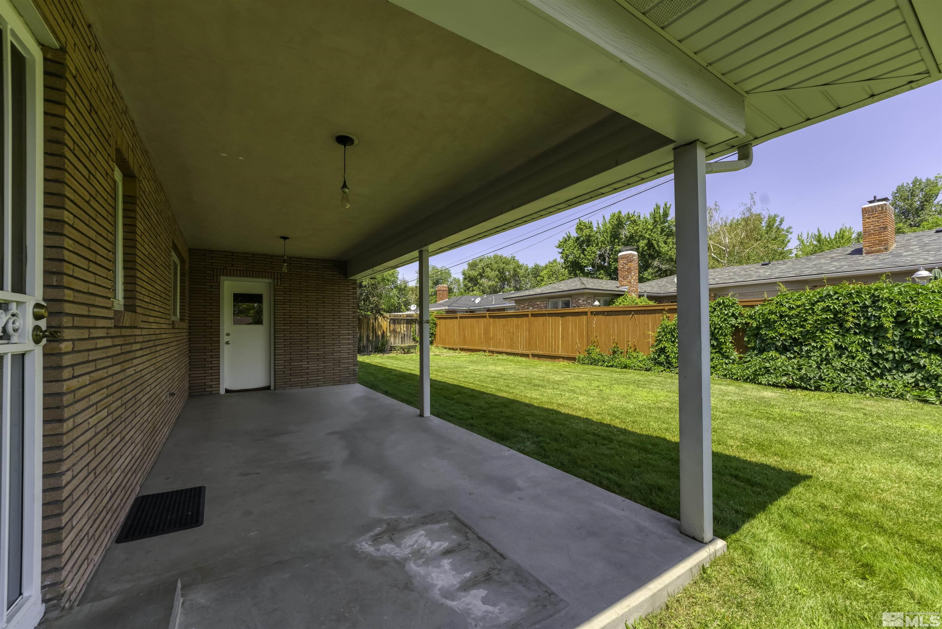 1401 Romero Way Reno, NV 89509 - Photo 24 of 28 a view of a porch with furniture and garden