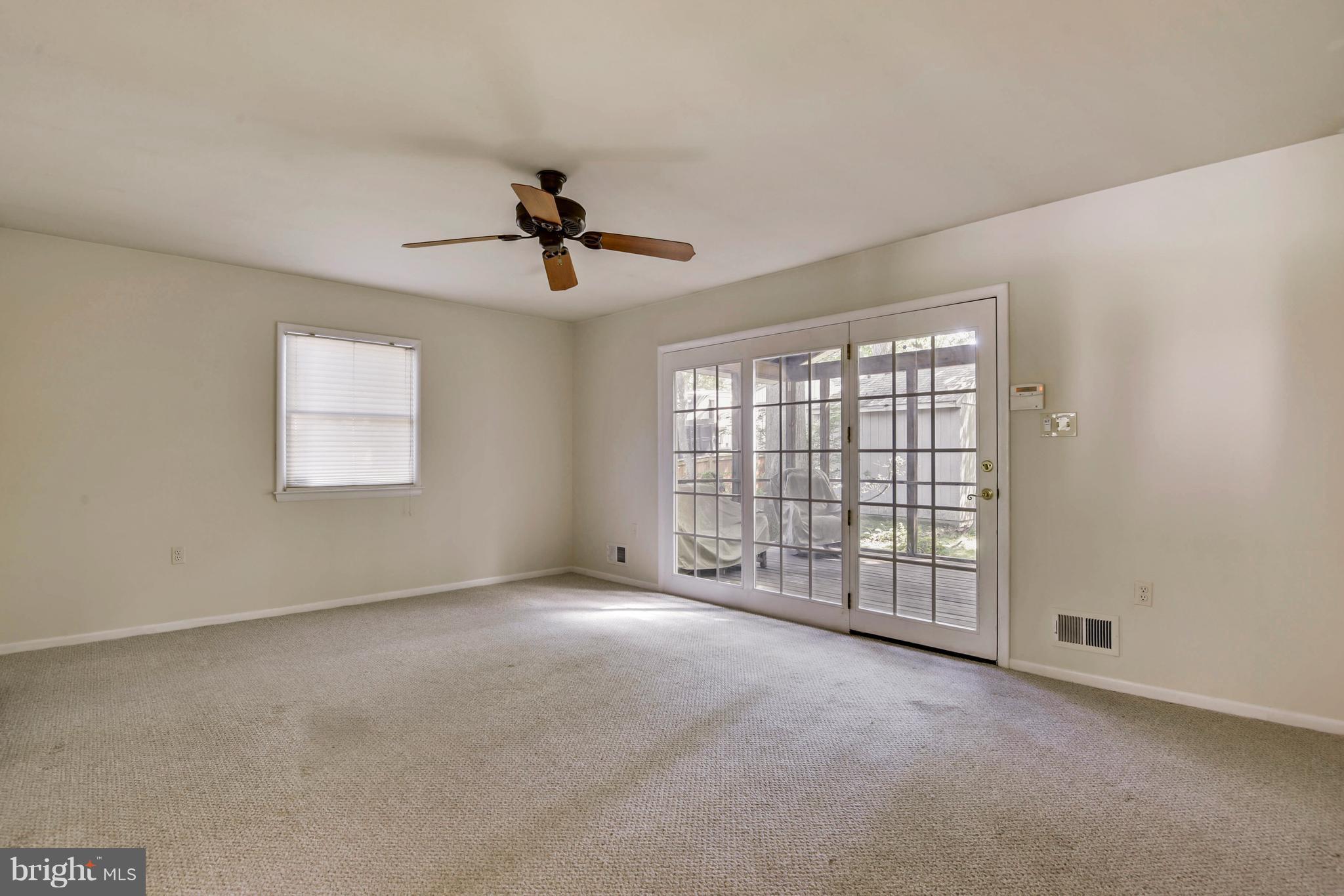 6005 Windham Road Laurel, MD 20707 - Photo 10 of 20 Family Room Addition Opens to Screened-in Porch