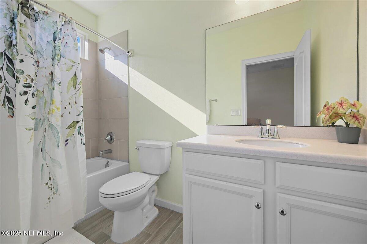 102 Anguilla Boulevard St. Augustine, FL 32092 - Photo 15 of 24 a bathroom with a sink toilet and shower
