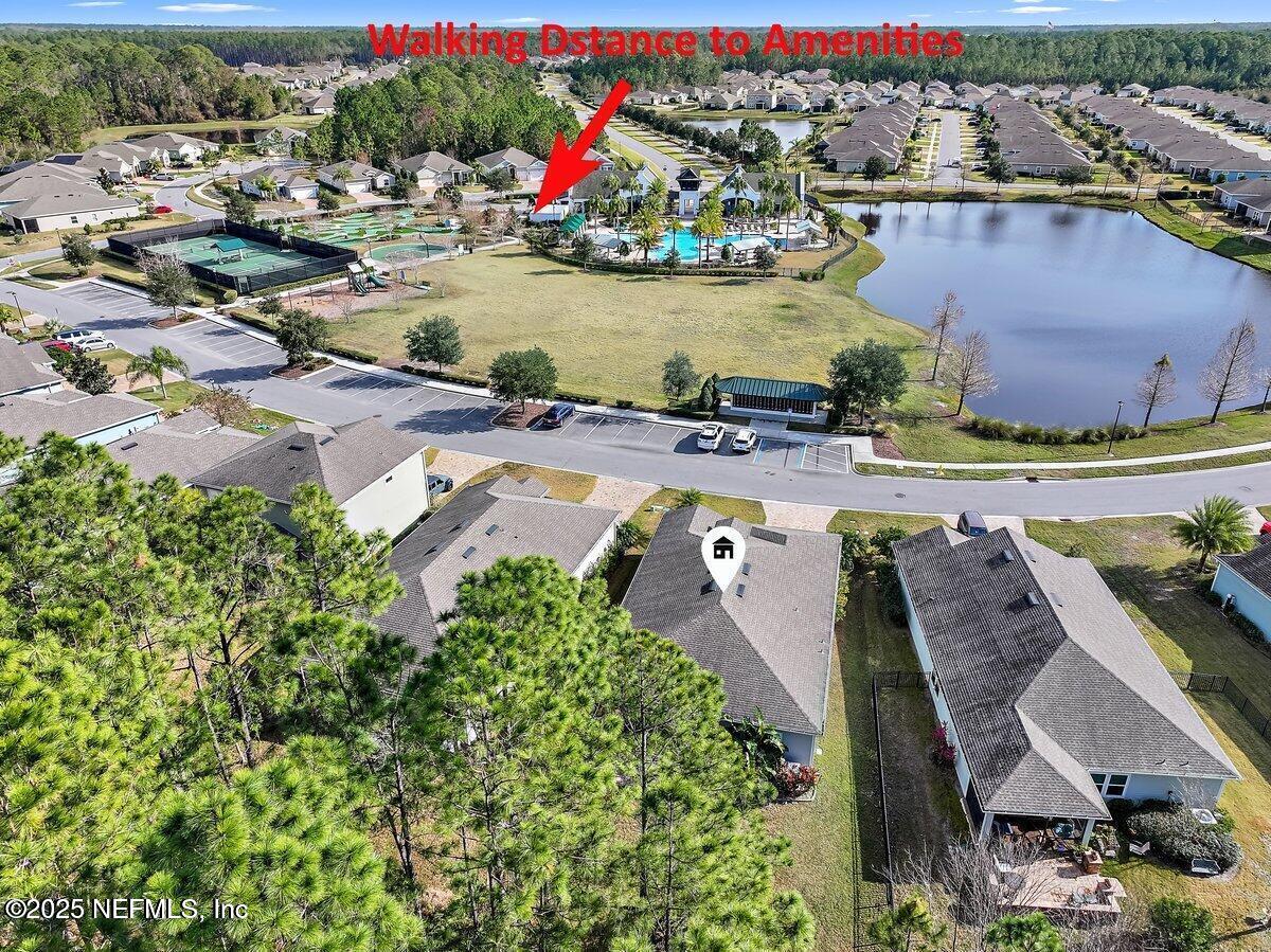 102 Anguilla Boulevard St. Augustine, FL 32092 - Photo 21 of 24 an aerial view of a house with a lake view