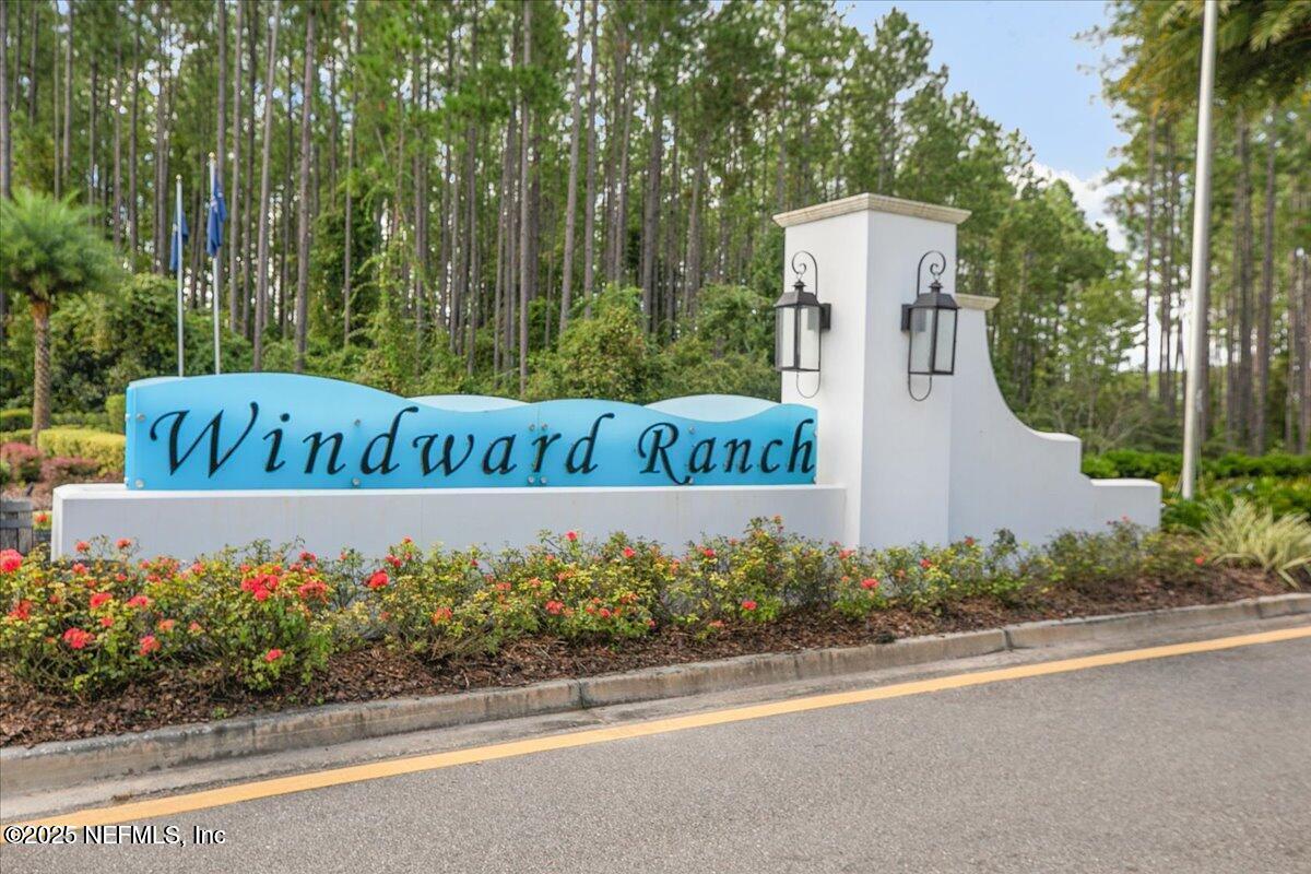 102 Anguilla Boulevard St. Augustine, FL 32092 - Photo 24 of 24 a view of sign board with flower around