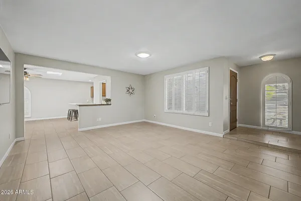 a view of an empty room and window