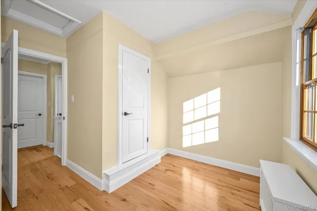 a view of an empty room and window