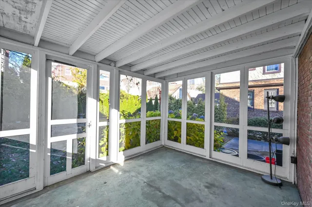 a view of porch with green space