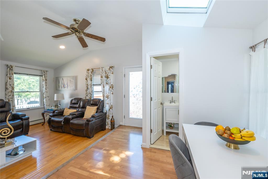 690 Garden Street Maywood, NJ 07607 - Photo 15 of 49 a living room with furniture and a window