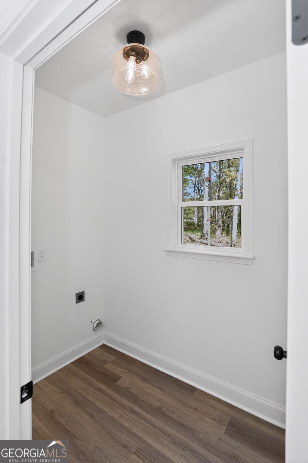 1229 Chappell Mill Road Jackson, GA 30233 - Photo 31 of 55 an empty room with a window