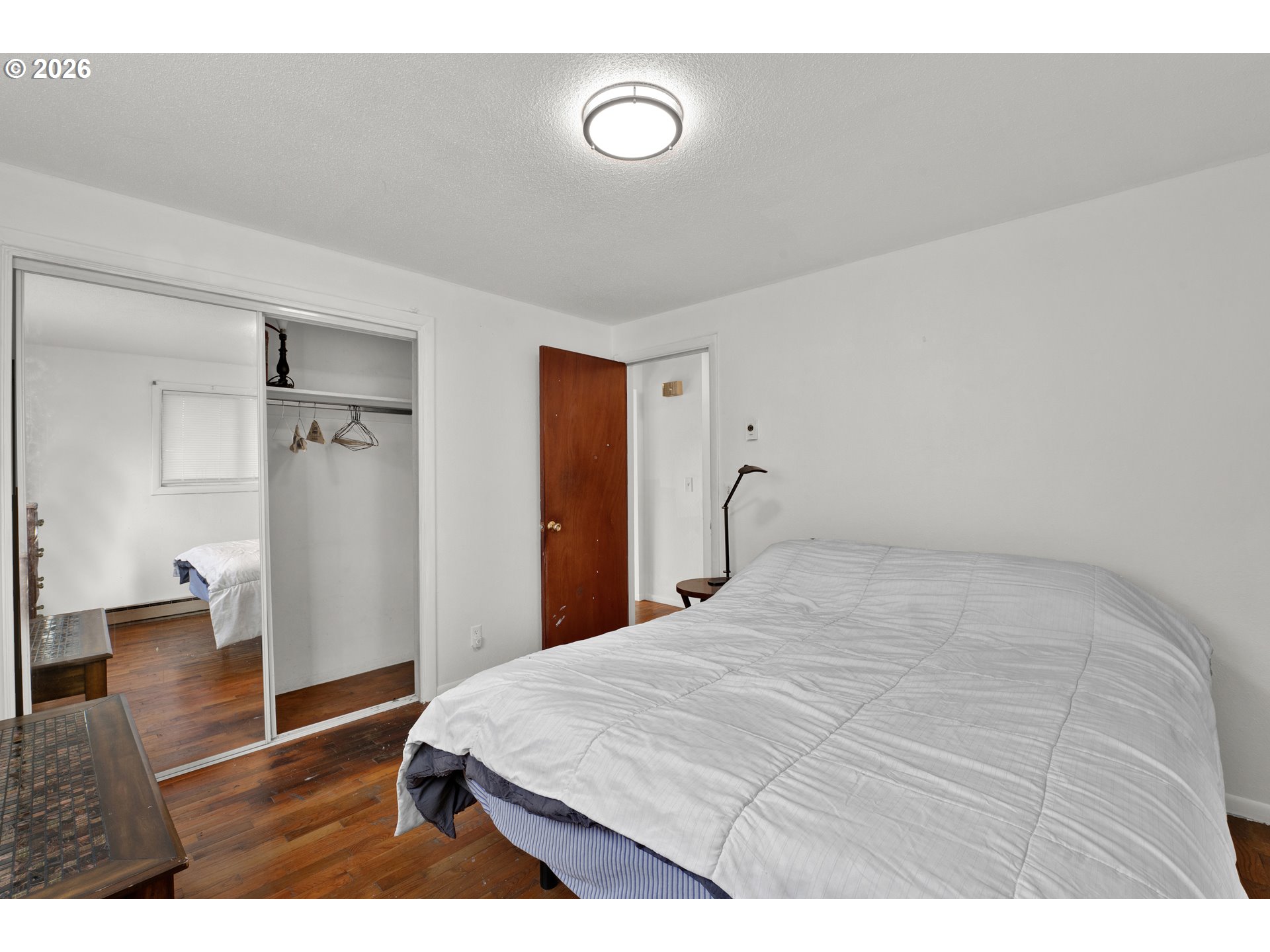 3307 Arrowhead Street Eugene, OR 97404 - Photo 11 of 46 a large white bed in a white room