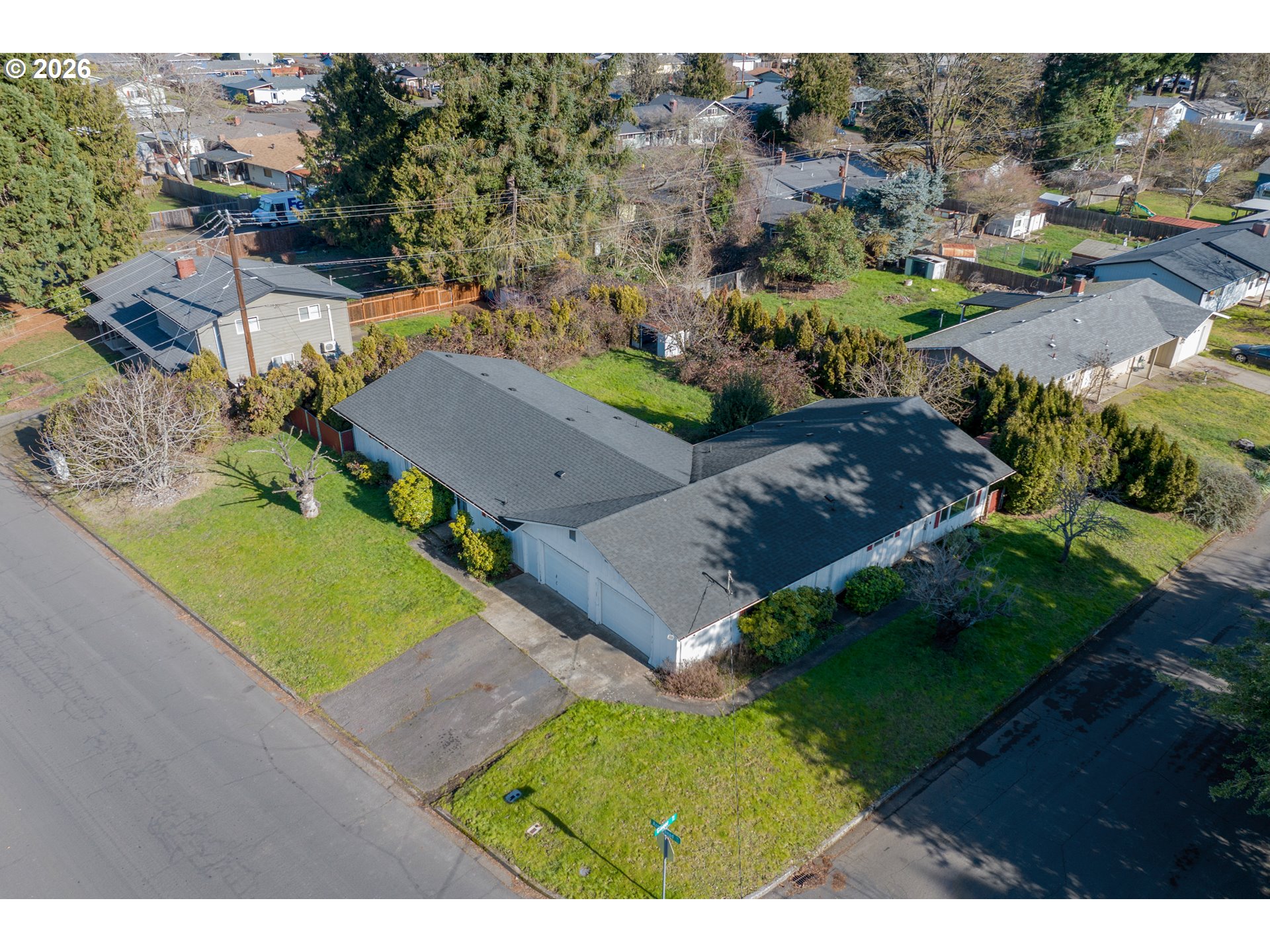 3307 Arrowhead Street Eugene, OR 97404 - Photo 3 of 46 an aerial view of a house with a garden