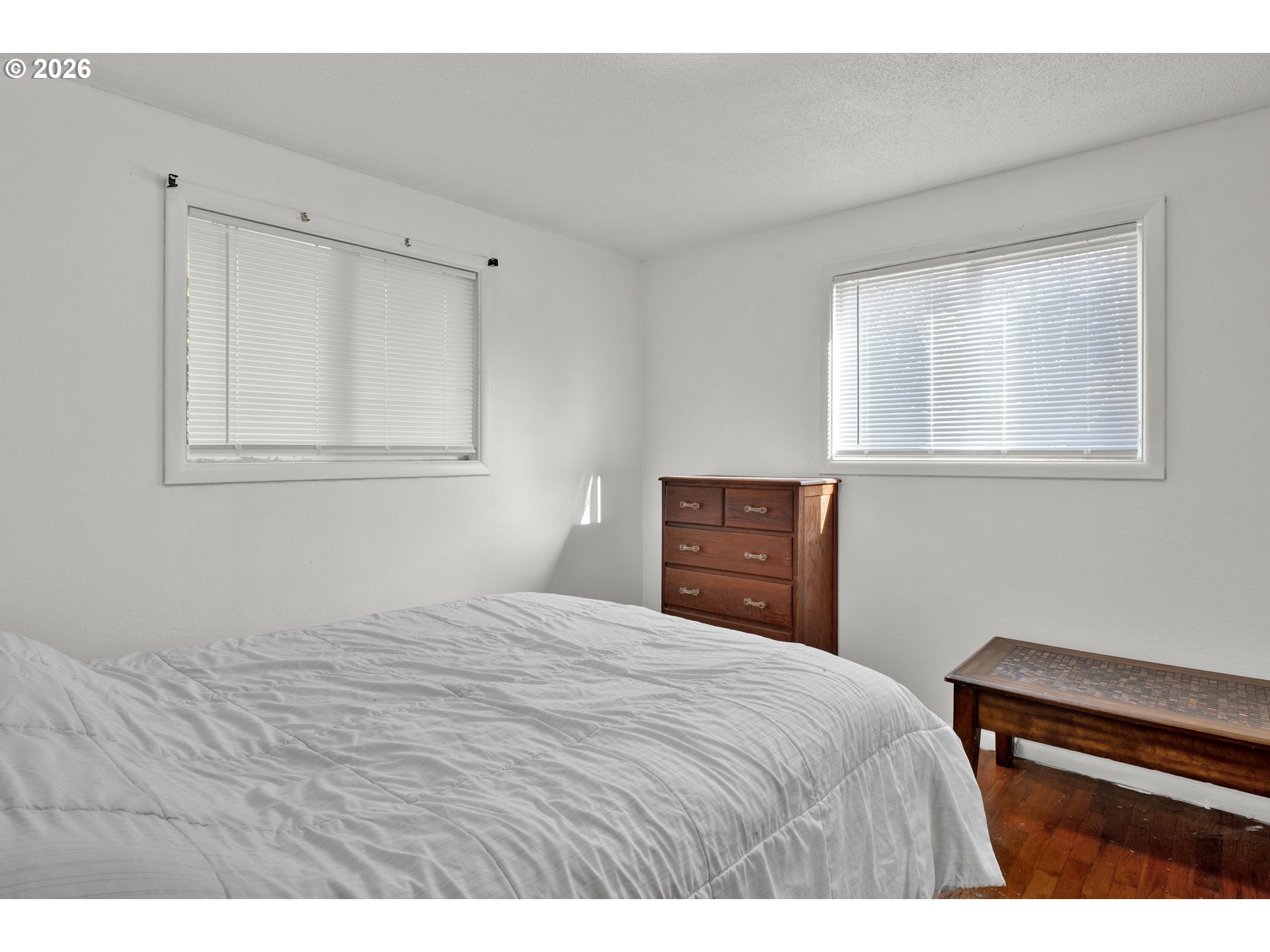 3307 Arrowhead Street Eugene, OR 97404 - Photo 10 of 46 a bedroom with a bed and a dresser