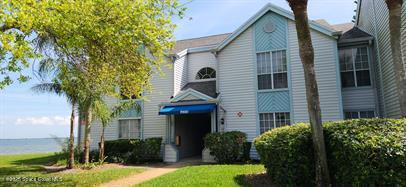 7000 N Highway, Unit 201 Cocoa, FL 32927 - Photo 1 of 32 a front view of a house with garden