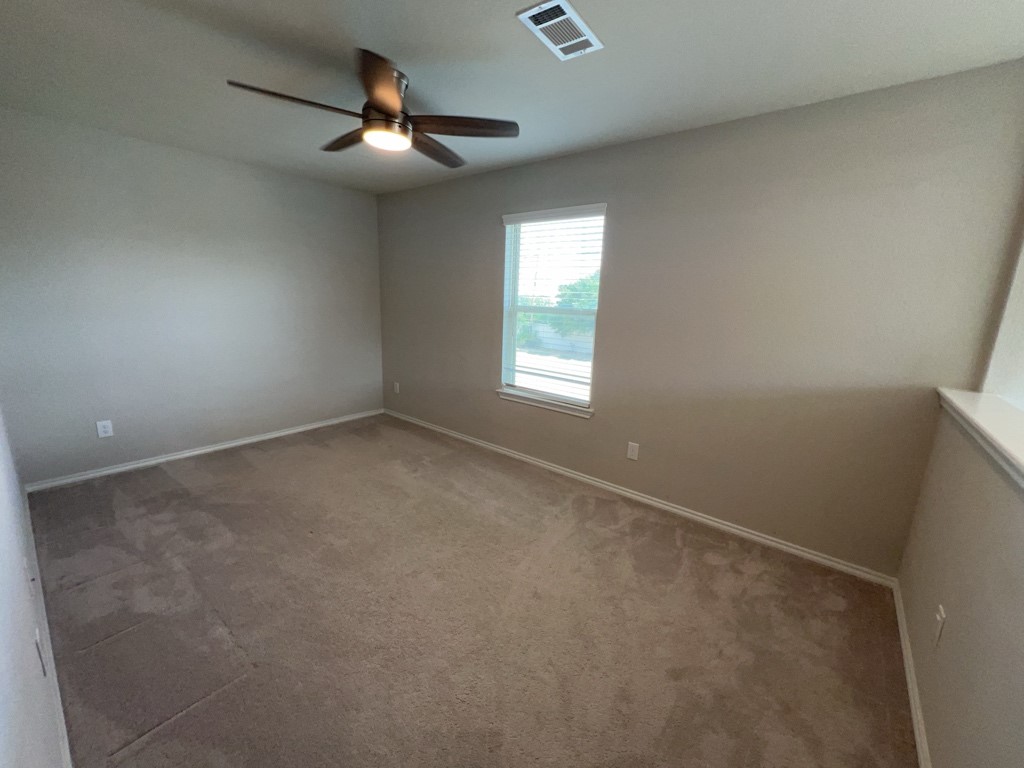 5135 Emma Forest Street Houston, TX 77018 - Photo 15 of 28 an empty room with a window