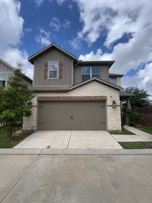5135 Emma Forest Street Houston, TX 77018 - Photo 2 of 28 a front view of a house with garage