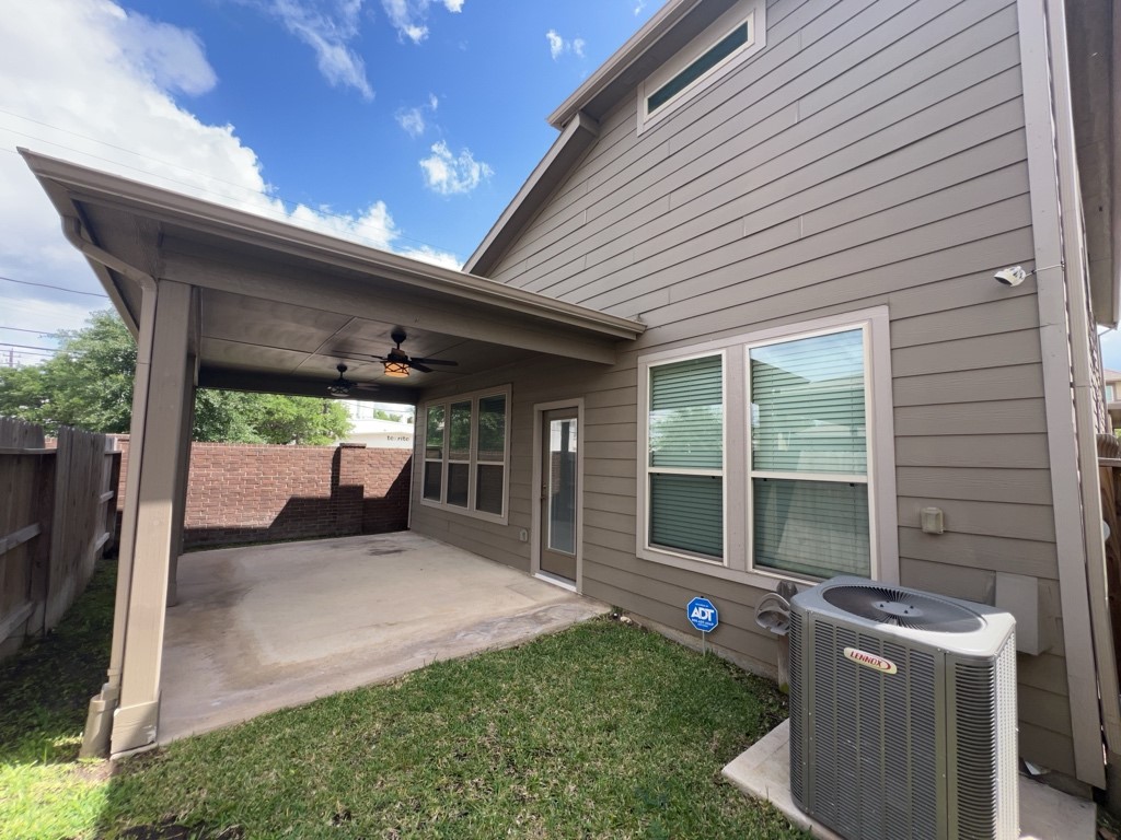 5135 Emma Forest Street Houston, TX 77018 - Photo 24 of 28 a view of a porch with furniture and floor to ceiling window
