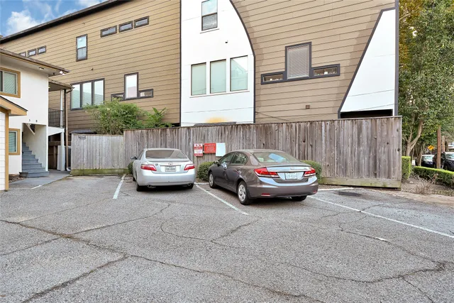 a car parked in front of a house