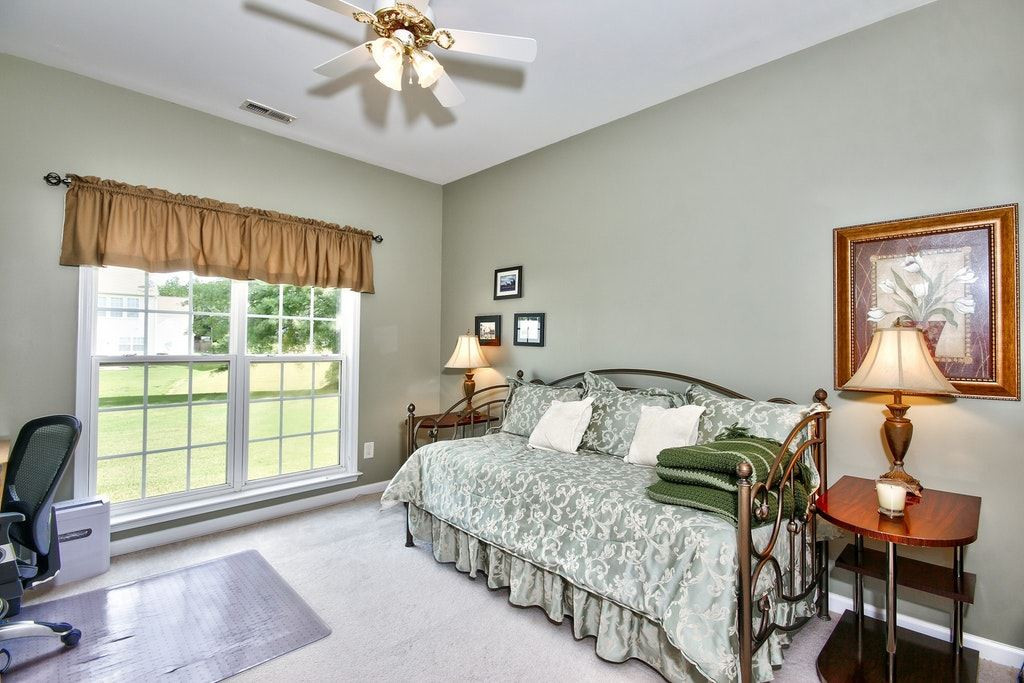 7624 Derek Drive Raleigh, NC 27613 - Photo 12 of 25 French doors open to the private and serene office on the first floor. Office
