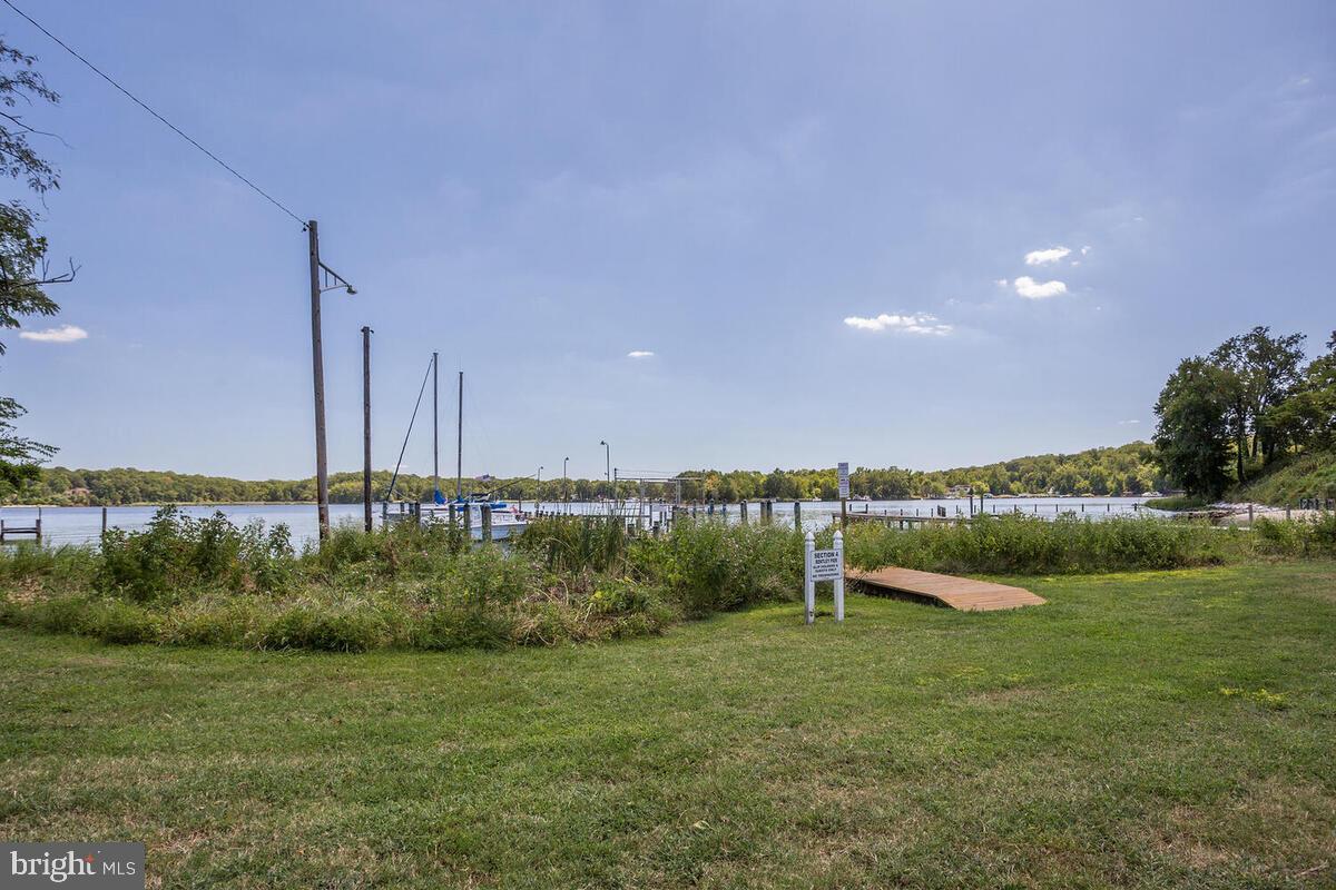 1724 Quantico Road Edgewater, MD 21037 - Photo 42 of 58 a view of a garden with lake
