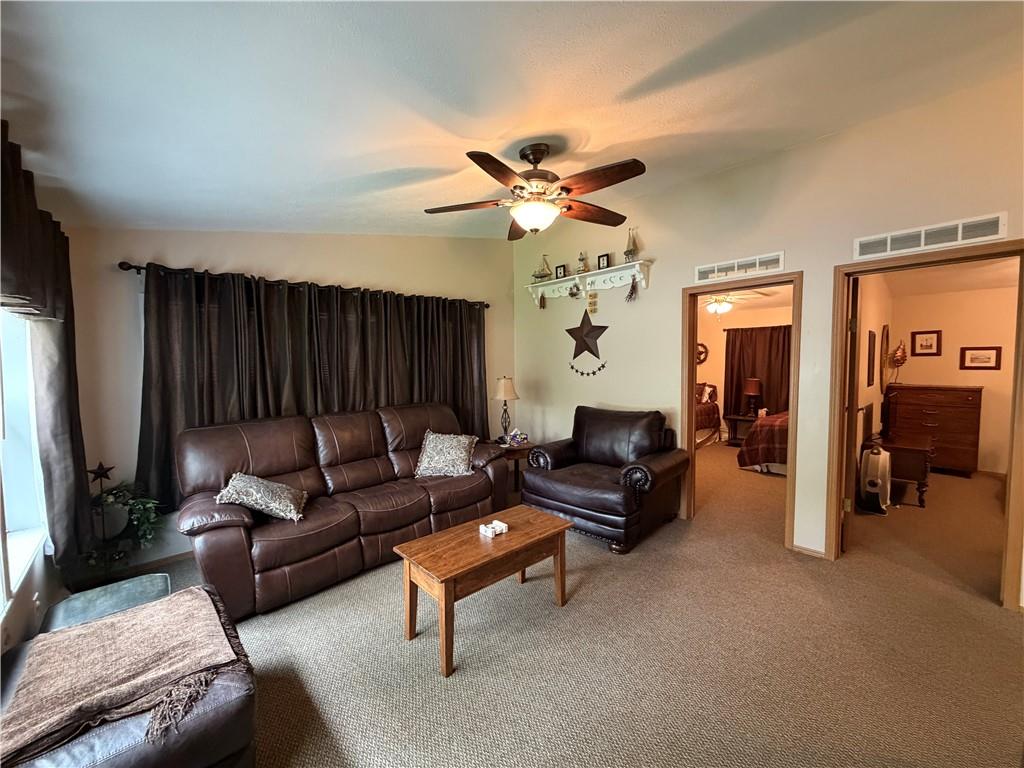 1881 Westford Road Jamestown, PA 16134 - Photo 24 of 50 a living room with furniture and a fireplace
