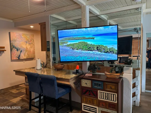 a view of a workspace with furniture