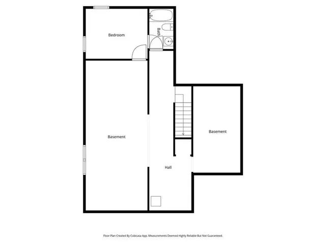 a picture of a bathroom with a shower