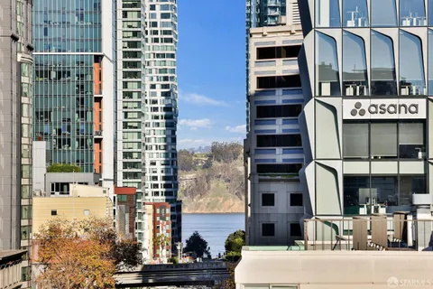 a view of a city with tall buildings