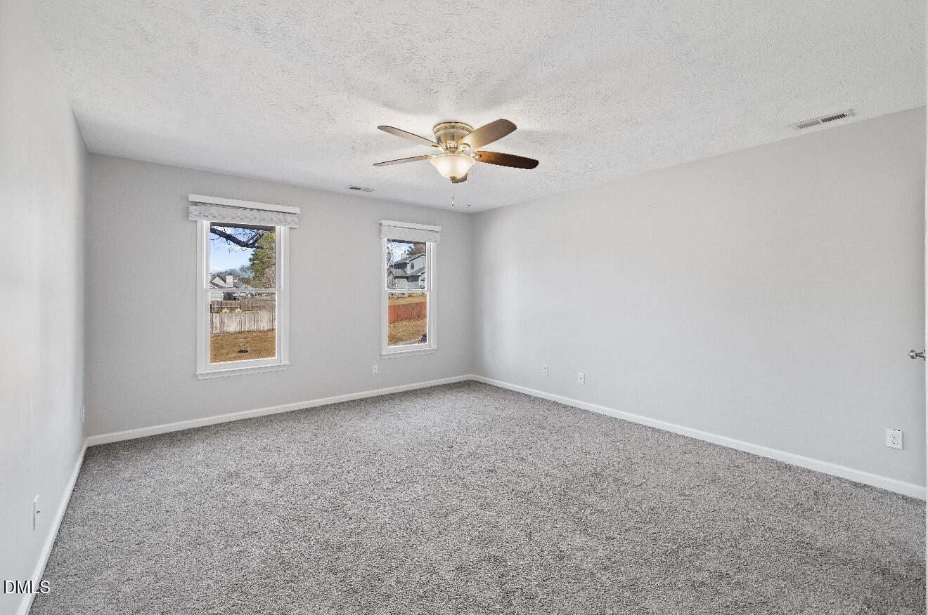 999 Flintwood Road Fayetteville, NC 28314 - Photo 16 of 23 a view of an empty room with a window