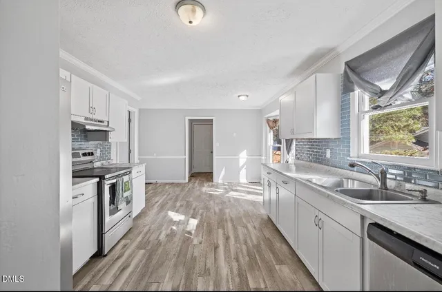a large kitchen with a lot of counter space